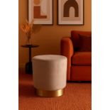 Milly Ottoman Footstool. A sleek round accent footstool upholstered in a heavy neutral weave fabric,