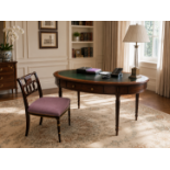 A Regency Style Mahogany Oval Writing Table and Coordinating Chair The Writing Table: An oval