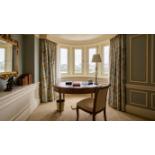 A Regency Style Mahogany Oval Writing Table and Coordinating Hepplewhite Style Shield-Back Chair The