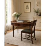 A Regency Style Mahogany Oval Writing Table and Coordinating Hepplewhite Style Shield-Back Chair The