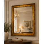 A Large Contemporary Giltwood Wall Mirror in the Classical Style The mirror features a substantial