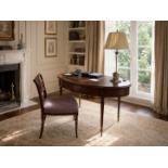 A Regency Style Mahogany Oval Writing Table and Coordinating Chair The grand oval top surface is