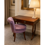 A Regency style Rosewood writing desk The moulded top inlaid with boxwood is supported by a simple