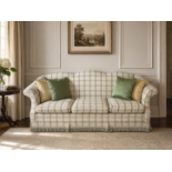 A Chippendale Revival Style Camelback Sofa in Plaid Upholstery A substantial three-seater sofa of