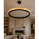 Alabaster and Bronze Halo Pendant Chandelier The fixture features a continuous, wide circular