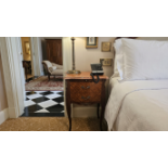 A Pair of Louis XV Style Inlaid Walnut and Marquetry Bombé Commodes An exceptional matching pair