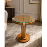 An Art Deco Style Maple and Glass Circular Pedestal Occasional Table by Francesco Molon A high-