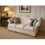 A Chippendale Revival Style Camelback Sofa A substantial three-seater sofa of grand proportions,