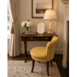 A William IV Style Mahogany Writing Desk and Accompanying Tub Chair The desk features a