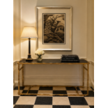 A Contemporary Bronzed Metal and Glass-Topped Coffee Table The table features a substantial