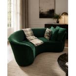 A contemporary forest green crescent-shaped curved sofa, expertly upholstered in premium velvet from