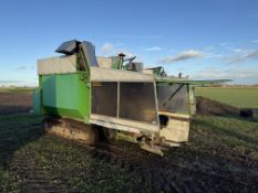 1995 Tumoba brussels sprout harvester, 2 row self propelled, six knife heads, cones, canopy lift,