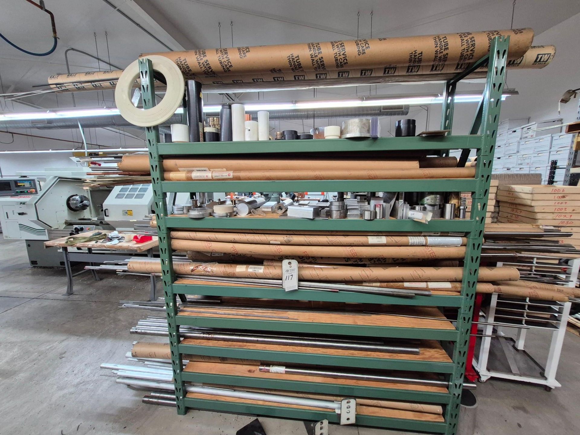 LOADED MEDIUM DUTY TEAR DROP SHOP RACK OF ASSORTED ROUND BAR STOCK ...