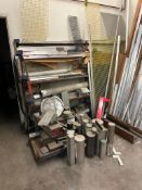 METAL STOCK ON VERTICAL STORAGE RACK & MISC. ROUND BAR STOCK