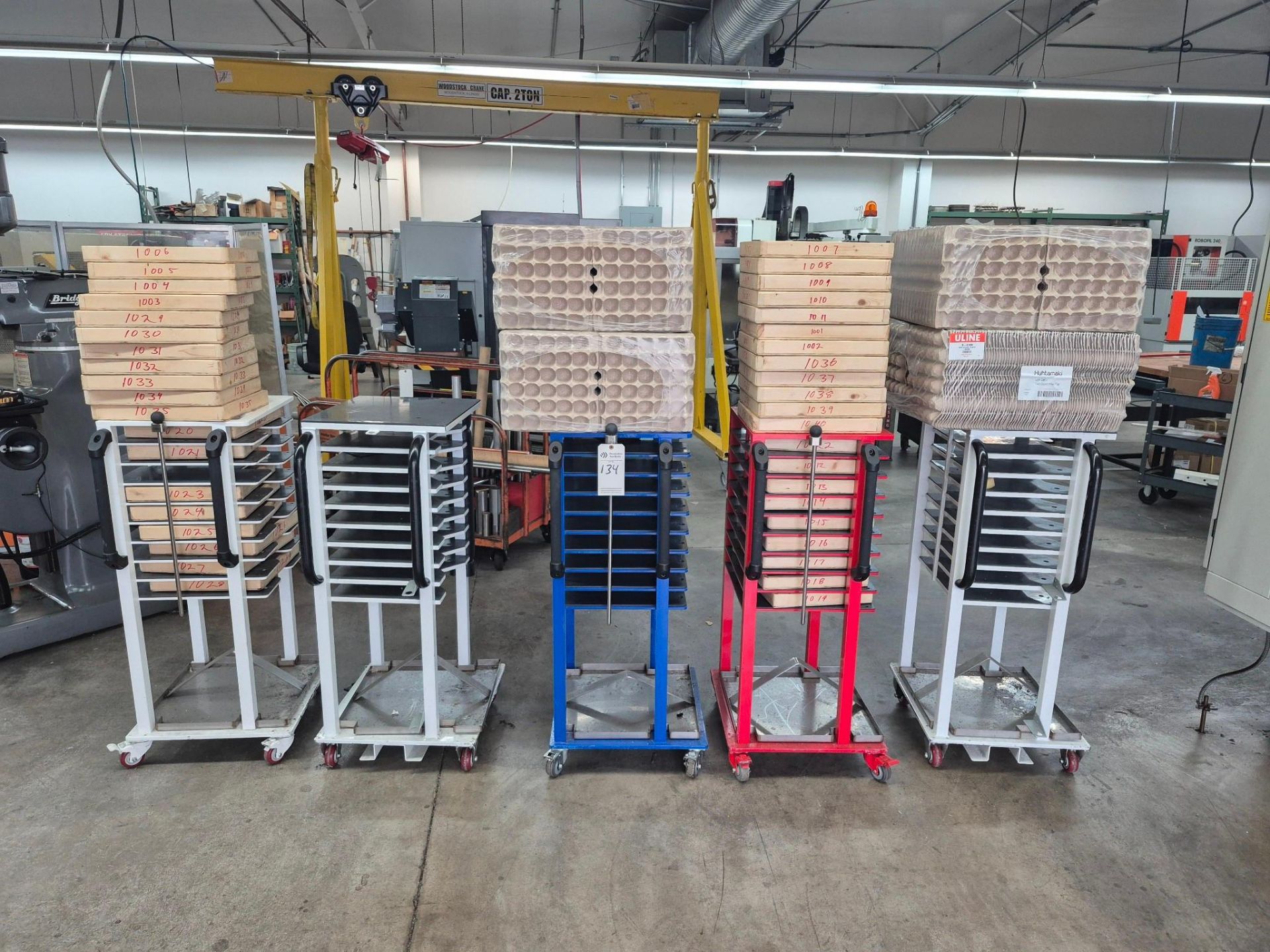 6 X 9 TRAY COMMERCIAL TRAY RACKS ON CASTORS, FILLED WITH PACKING ...