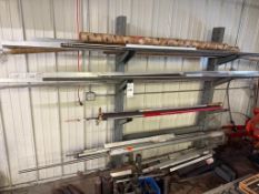 4 ARM CANTILEVER BAR STOCK RACK, WELL STOCKED WITH MISC ROUND, SQUARE + FLAT BAR STOCK AND OFF CUTS