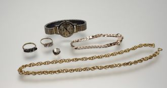 A 9ct gold ring set with three graduated clear stones P 2g, together with a yellow metal necklace, a