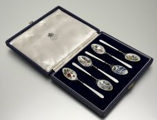 A Birmingham silver set of six guilloche and floral botanical enamel coffee spoons: l. x 10cm in
