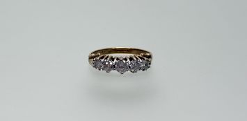 A 9ct gold graduated five clear stone set ring Q/R 2.92g