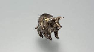 A late Victorain Berhold Muller Chester silver lucky pig figure sitting within a horse shoe: h. x