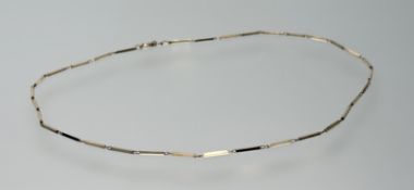A 9ct gold lozenge link necklace with ring fastening: l. x 20cm 3.59g