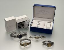 A collection of six various modern wristwatches to include a Tissot stainless steel quartz watch