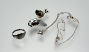 An Oliver Bonas sterling silver Dachshund pendant: l. x 0.5cm on silver trace link chain necklace