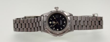A Tag Heuer stainless steel quartz professional divers style wristwatch on orginal bracelt and black