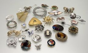 A collection of vintage brooches to include a pewter Celtic knot and thistle circular brooch: d. x
