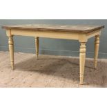 A modern hardwood extendable dining table, marquetry oak top with fold-out leaf, raised on tapered