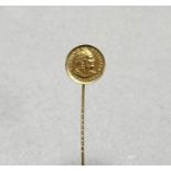 Peru Republic; a 1/5 Libra gold coin, 1912, mounted as a stick pin. Length overall 7.5cm, total