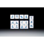 15 blue and white Dutch Delft tiles with large birds, 17th C.
