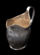 GEORGE III SILVER CREAM JUG, London 1806, helmet form with reeded handle, bright cut decoration