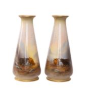 PAIR OF CROWN DEVON TAPERING VASES, painted with Highland Cattle by G. Cox, gilt rims, 23.5cms