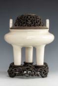 CHINESE BLANC DE CHINE PORCELAIN TRIPOD CENSER, DING, Dehua Province, with raised loop handles,