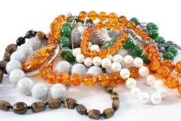 BALTIC AMBER BEADED NECKLACE with matching bracelet, together with a Baltic amber pendant necklace