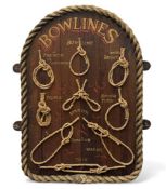 REPRODUCTION PAINTED ARCHED WOODEN SIGN, showing a display of bowlines within rope border to