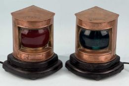 PAIR OF SEAHORSE PORT & STARBOARD COPPER LAMPS, mounted on modern wooden stands with electrical