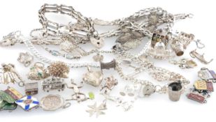 ASSORTMENT OF SILVER JEWELLERY, including charms and bracelets, gross weight approx. 140g