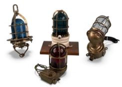 FOUR BRASS CASED SHIP'S BULKHEAD LIGHTS, two starboard, one port, and one clear Provenance: