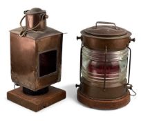 TWO COPPER PORT LAMPS, square on stained wooden base, 50cms (h); and circular on stained wooden
