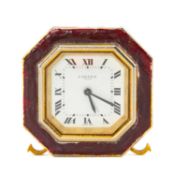 CARTIER PARIS DESK CLOCK with red enamel octagonal frame, easel back, 7.5cms (h) Provenance: private