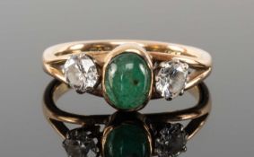 CABOCHON EMERALD & DIAMOND THREE-STONE RING, emerald approx. 6 x 5mms, in a collet mount flanked
