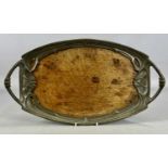 URAINIA ART NOUVEAU PEWTER & OAK OVAL TWO-HANDLED TEA TRAY, cast surround, pierced and with stylised