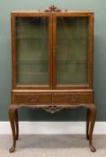 REPRODUCTION BURR WALNUT DISPLAY CABINET, two doors with glazed interior shelves and two drawers,