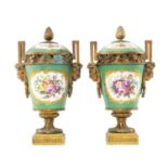 PAIR 19TH CENTURY SEVRES-STYLE ORMOLU MOUNTED PORCELAIN VASES & COVERS, painted with flower sprays