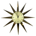 METAMEC GILT METAL-CASED 'STARBURST' WALL CLOCK, quartz movement, dial signed and with Arabic