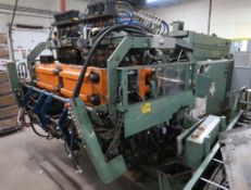 Uniloy blow molder machine- used for making half gallon milk bottles