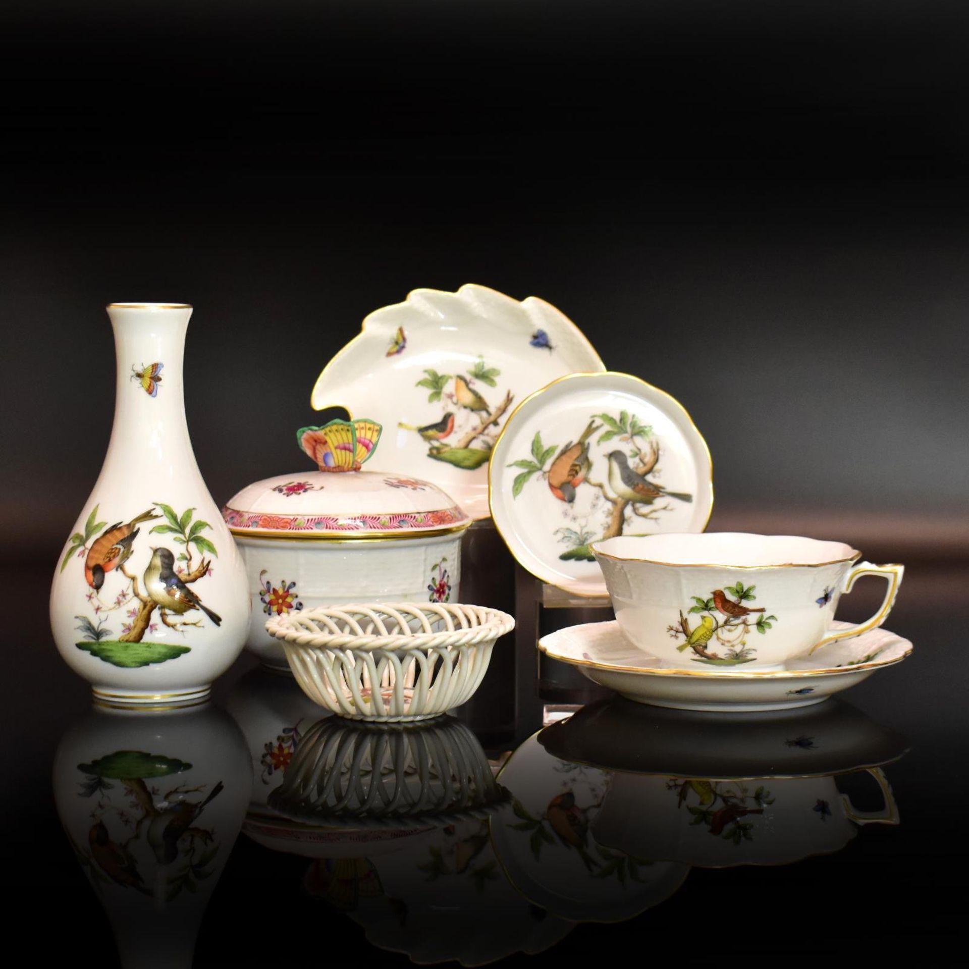 Konvolut, 15tlg. Herend | Porzellan, Farb- und Goldstaffagen.