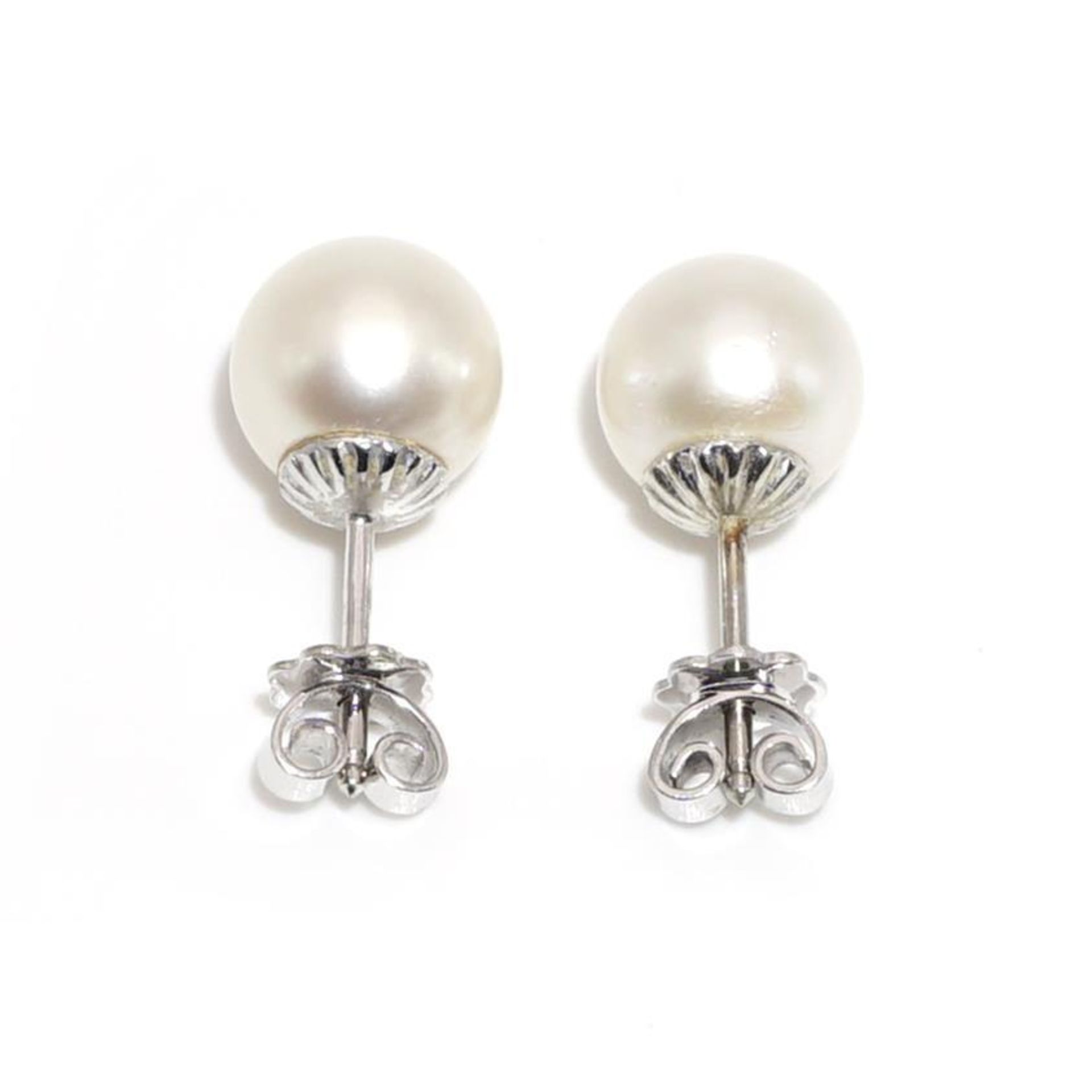 Ein Paar Ohrstecker. 14 K WG. Ein Drücker 18 K WG. - Bild 2 aus 2